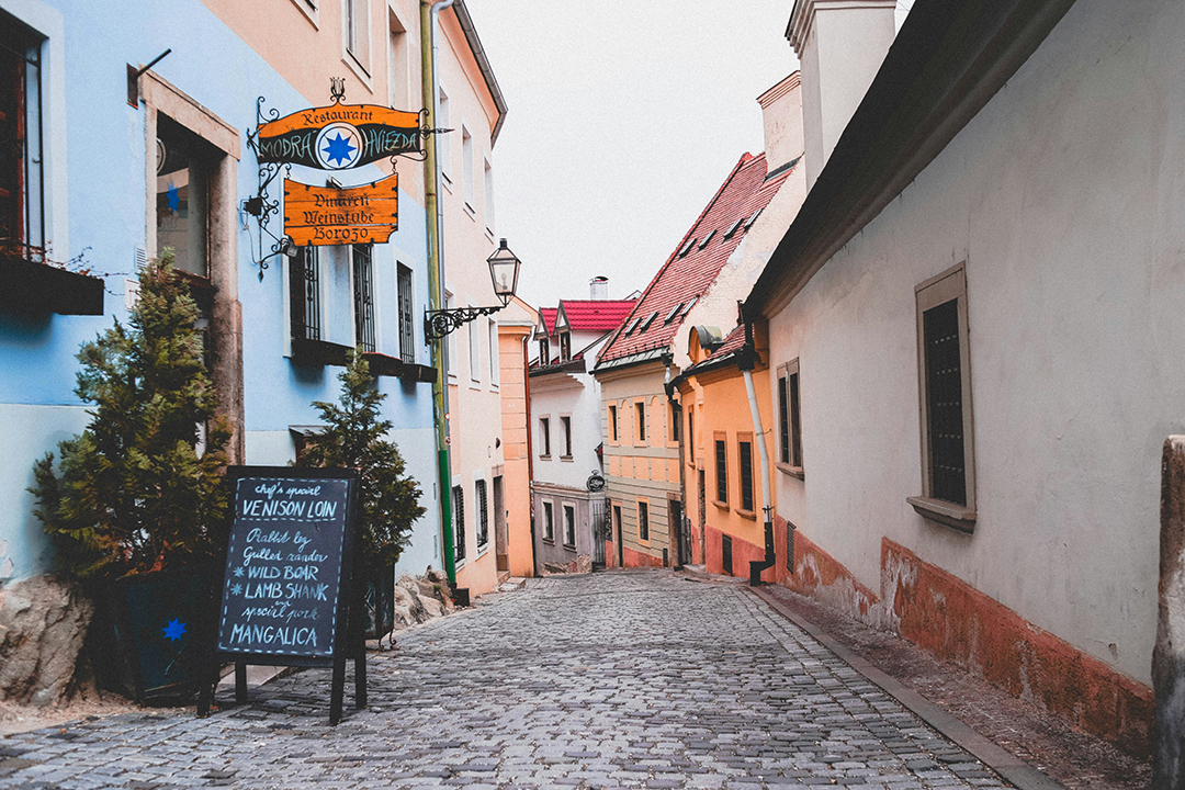 The narrow cobbled streets of Bratislava’s old town create a relaxed and historic atmosphere.