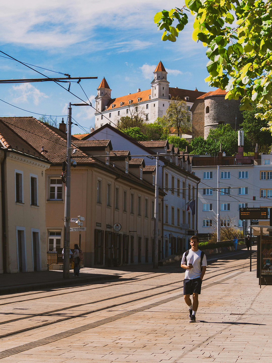 A view of Bratislava Castle from the old town streets reveals one of Slovakia’s most recognizable landmarks.