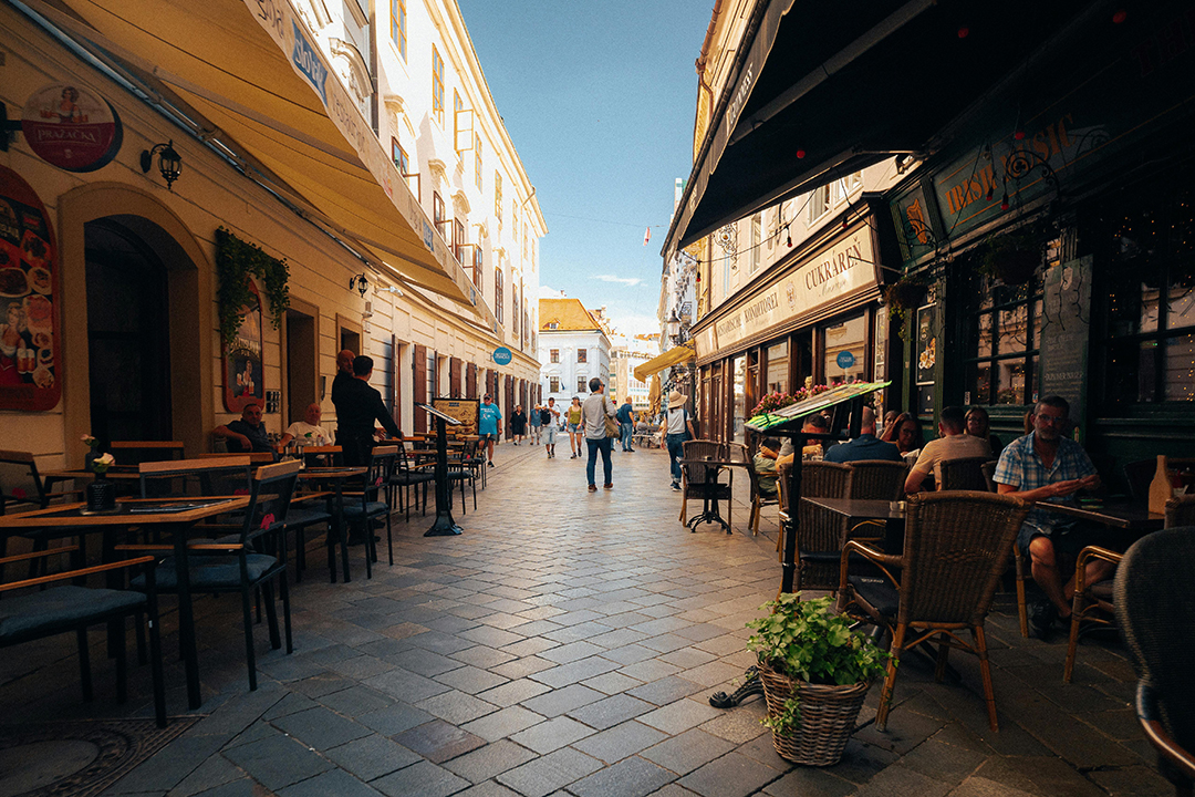 Bratislava’s evening streets offer a pleasant atmosphere of cafés, restaurants, and relaxed city life.