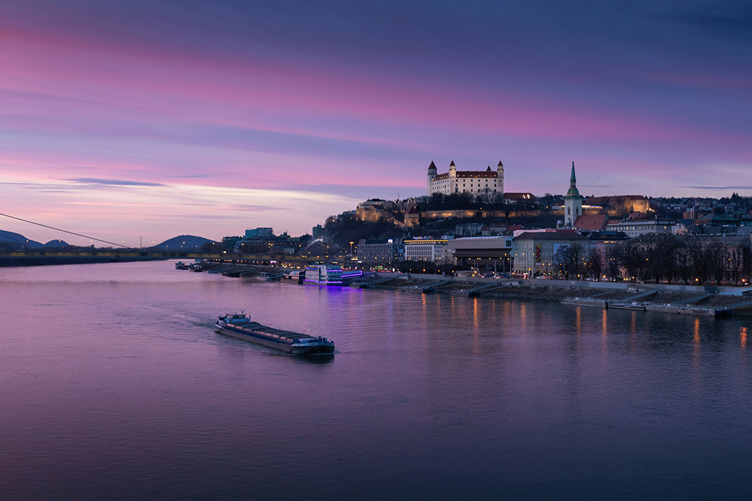 An evening view of Bratislava along the Danube captures the relaxed atmosphere of the Slovak capital.