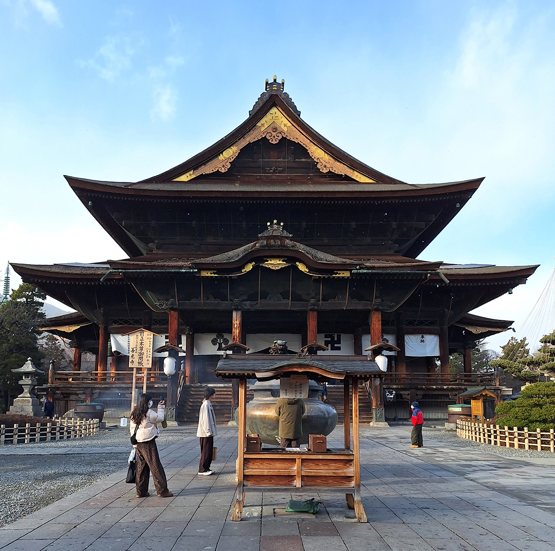 Traditional Zenkoji Buddhist temple in Nagano, Japan during an evening temple visit