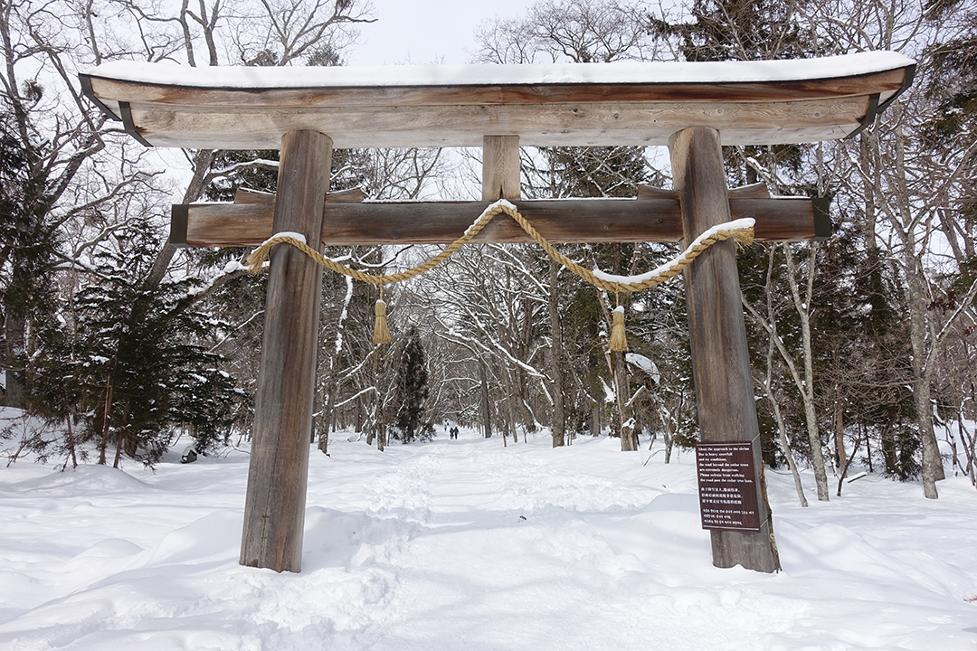 Snowy entrance to Togakushi-jinja shrine in the mountains near Nagano, Japan