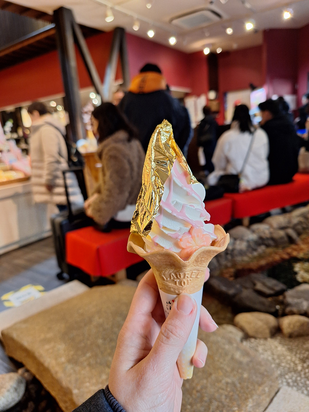 Kanazawa's famous gold leaf ice cream combines local craftsmanship with a unique culinary experience, reflecting the city's long tradition of gold leaf production.