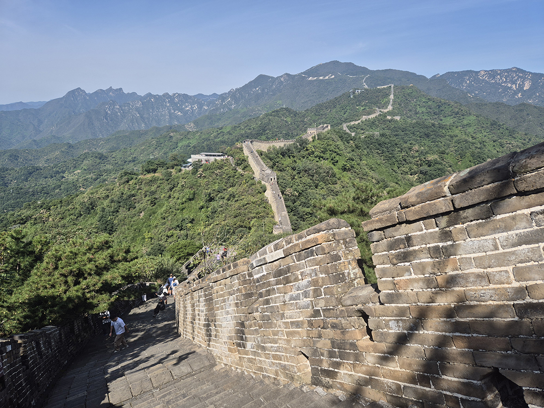 The Great Wall of China winds across the green mountains north of Beijing, offering one of the country's most spectacular panoramic views.