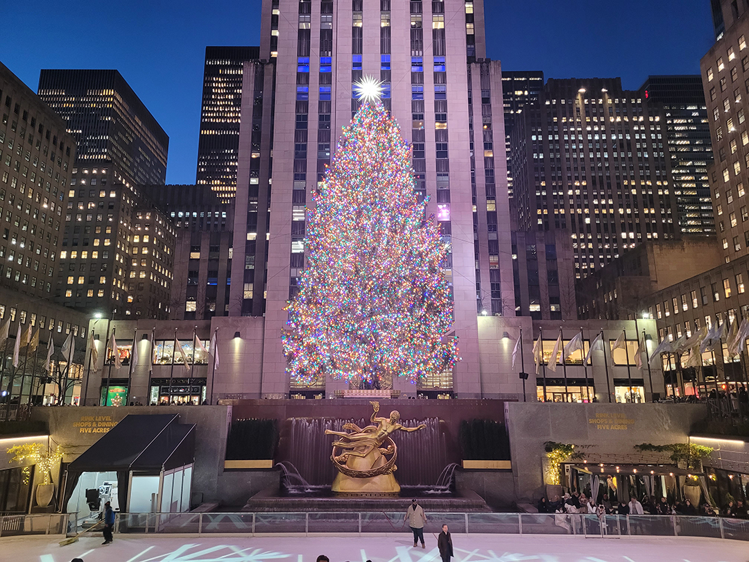 The famous Christmas tree at Rockefeller Center above the skating rink creates one of New York City's most beloved holiday attractions.