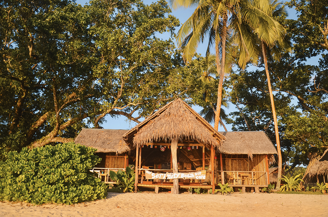 A simple beach restaurant on Espiritu Santo Island serves local cuisine in a relaxed seaside setting.